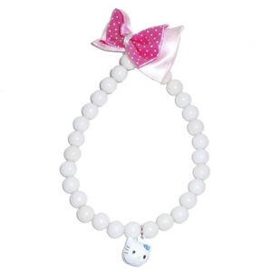 Necklace with beads, bow tie and bell