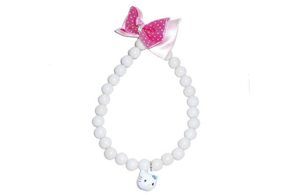 Necklace with beads, bow tie and bell